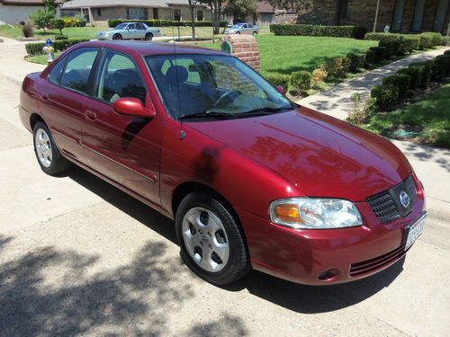 2005 nissan * low miles * 4 door auto with ac * extended warranty * gets 42 mpg!