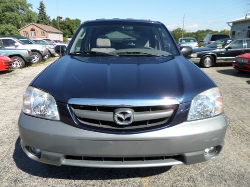 2002 mazda tribute lx awd,serviced,new tires,runs great,no reserve.