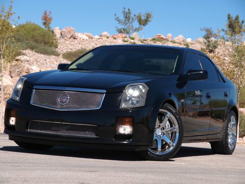 One badass caddy 2004 cts-v ls6 cammed long tube headers intake 450+hp see video