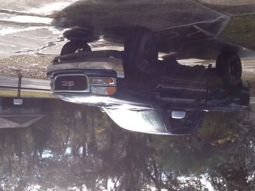 2000 gmc Sierra , 2wheel drive, 6in suspension, 18in fuel rims made by foose, image 2