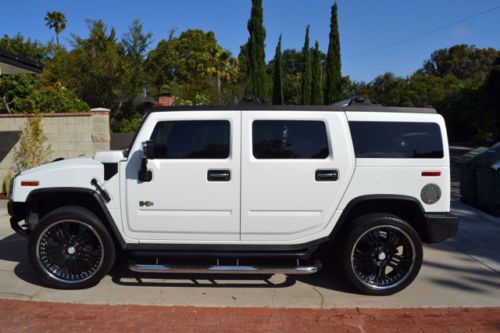 Lxy pkg, white/blk, tint, 24&#034; black lexani whls, kenwood dvd/nav