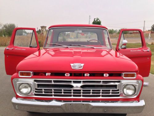 Red 1966 ford f100 pick up truck