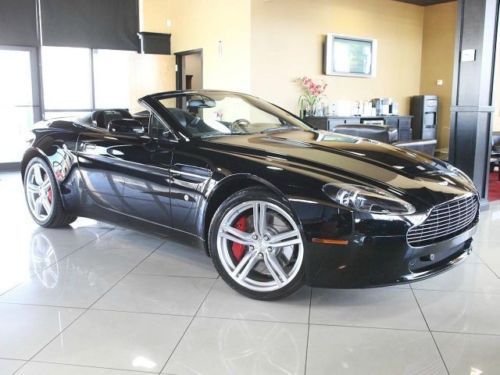 09 aston martin vantage under 2k miles flawless triple black carfax certified