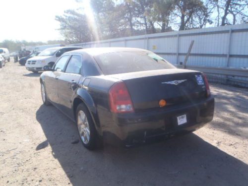 Chrysler 300c black with  2.7 engine.