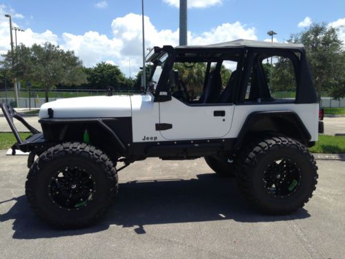 1993 jeep wrangler yj completely restored with tons of extras.