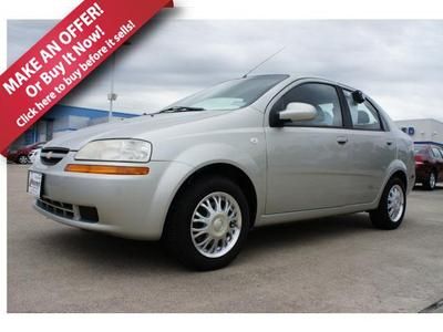 05 ls manual 1.6l 35/27 mpg silver 4 door sedan w/ac 88706 low miles we finance