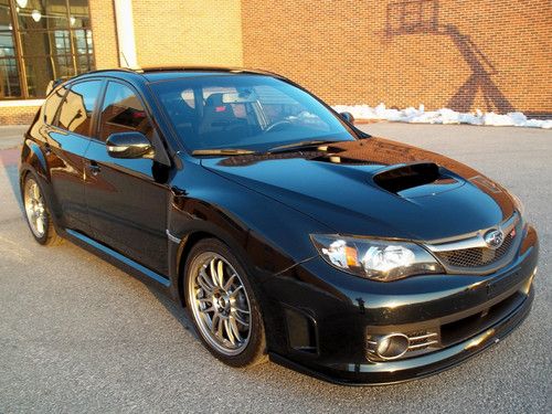 Black on black wrx sti six speed with leather turbo all wheel drive