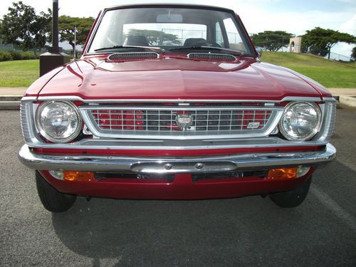 Classic 1974 toyota corolla sedan beautiful condition,custom lexus red paint.