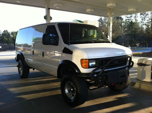 2006 e350 6.0l diesel 4x4 custom van for sale!