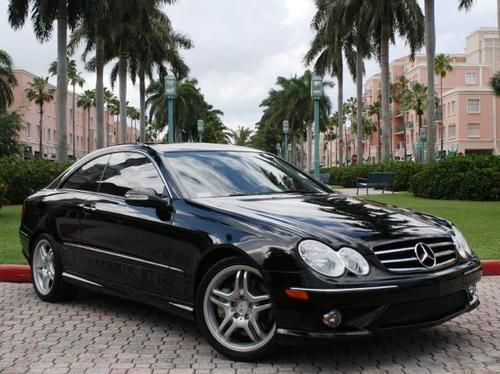 Like new black on black clk550 amg sport package only 15k 1-owner miles perfect!