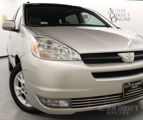We finance 04 leather heated seats 3rd row cd changer dual power doors sunroof
