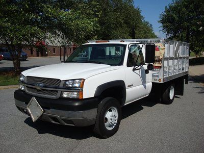 Awesome 1 owner chevrolet silverado 3500 flatbed!!! 4x4 low miles w pwr lift