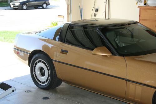 1984 corvette c4, beautiful gold/black, newly painted,new carpet,upgraded gauges