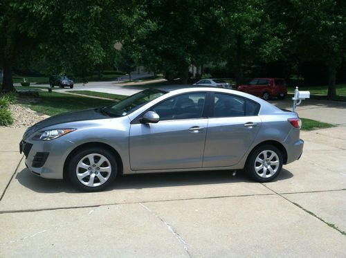 Mazda 3 - silver, 4 door, manual