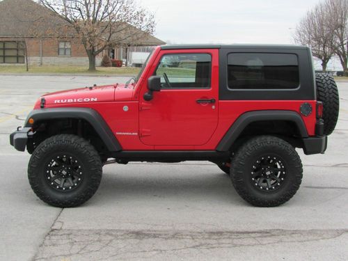 2010 jeep wranger rubicon v-6, 6-spd, hard top, nav, 4.5' skyjacker lift, 35's