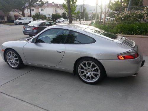 2001 porsche carrera 2 tip tronic looks and runs amazing very low miles. cu.rims