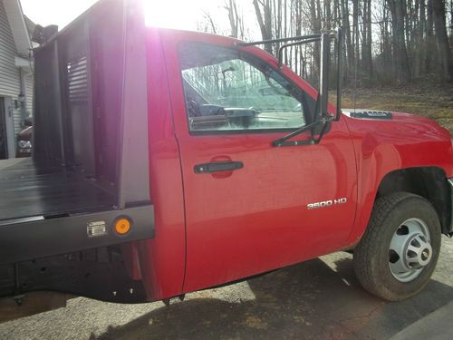 2011 3500  12' flat bed 1 ton dually; single cab 4wd