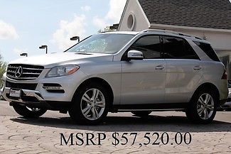 Iridium silver metallic auto awd p i pkg h/k surround sound only 9,550 miles