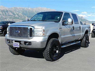 Ford crew cab lariat 4x4 powerstroke diesel custom lift wheels tires leather