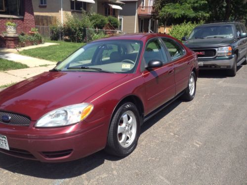 Sedan, low mileage, maroon, leather interior, good condition, oil changes
