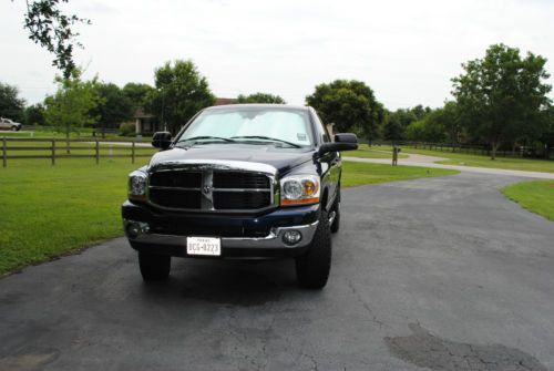 5.9 l. cummins turbo diesel, under 35 k miles, slt lone star package