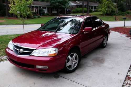 2002 red acura tl3.2, 6 cd changer, sirus radio, tan leather seats, new tranny