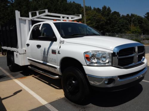 Ram 3500 4wd stake bed w/ lift gate5.9 cummins