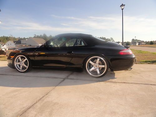 Beautiful  black and tan  911 carrera convertible, new top and hydraulic cyl.