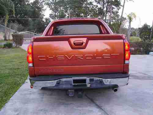 2004 Chevy avalanche, four door, orange,, image 6