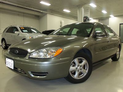 Low miles, power windows, power locks, keyless entry, gray/gray, cd, cruise!