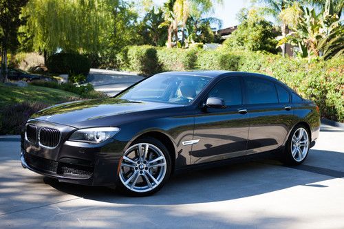 2012 bmw 750li w/ driver assistance, luxury seating, and m sport packages