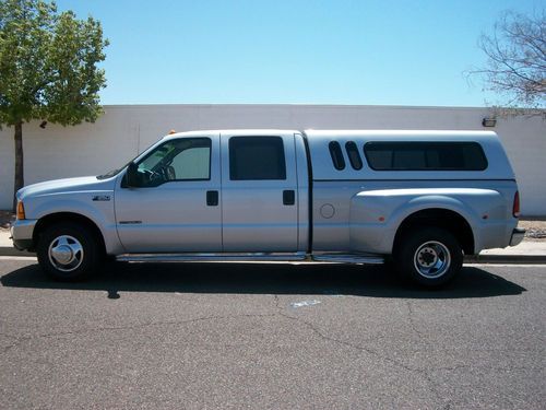 2000 silver ford super duty f350 crew cab 7.3 diesel 76k miles