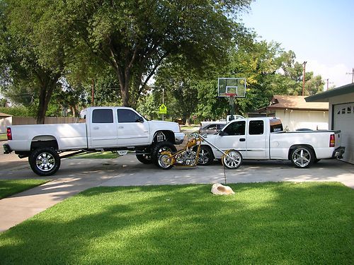 Crew cab chevy cst lift, 22'' wheels,tvs,dvd,exhaust,custom stereo,very nice**