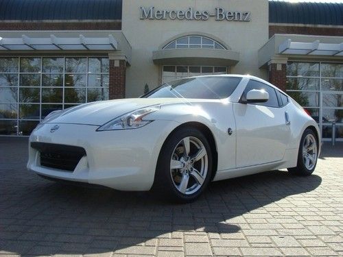 2010 370z  coupe white with black leather! exceptionally maintained