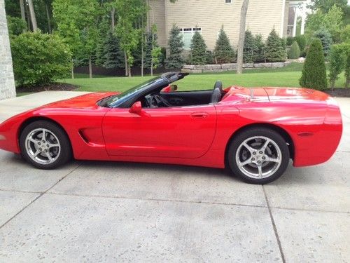 Red, loaded, original owner, 17,500 miles, always kept indoors,