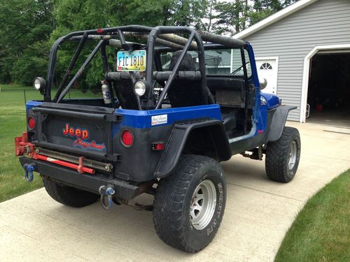 1993 jeep wrangler with built 350, 700r4, np242, dana 44's, 35" w/ bead locks