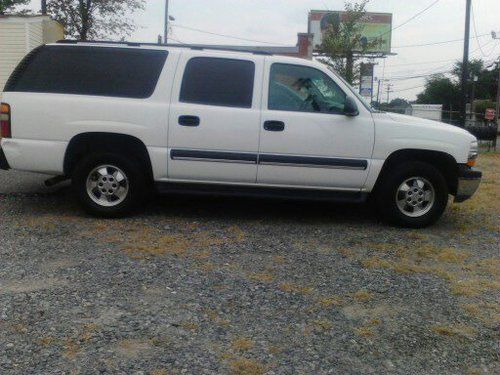 White, 2003 chevy suburban, excellent condition, runs great.