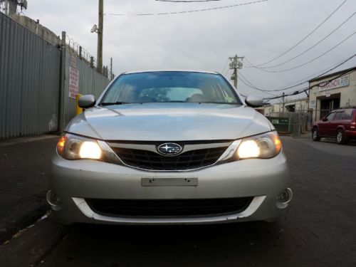 2009 subaru impreza sedan with small body damage drives mint awd