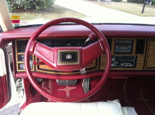 White cadillac eldorado biarritz 1984 v-8 with 33,000 miles mint