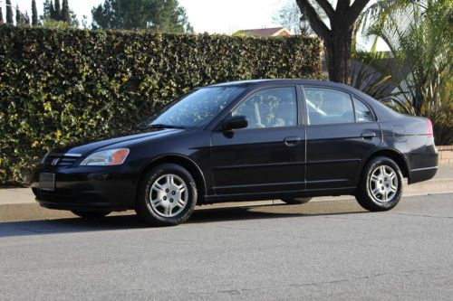 2002 honda civic lx black 4-cyl, 1.7l, automatic 4 door sedan gas saver, 1 owner