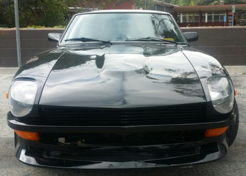 Black on black 1971 datsun 240z