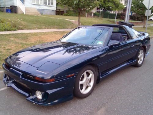 1987 toyota supra turbo, targa top, 5 speed, lots of mods very fun! ~125k mile