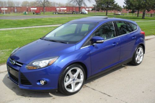 2013 ford focus titanium hatchback 2.0l/no reserve/5 speed/navi/camera/rebuilt