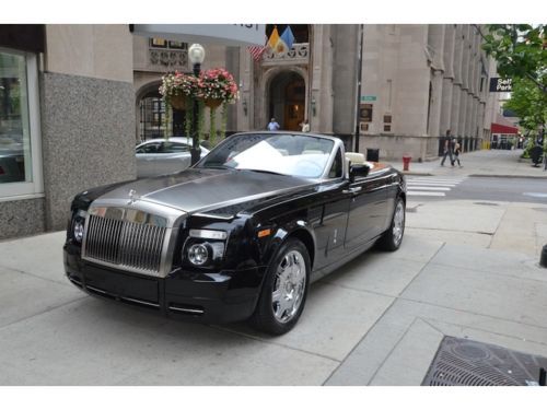 2008 rolls royce phantom drophead coupe.  diamond black with creme lt.