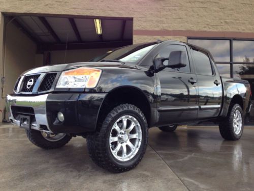 2010 nissan titan pro 4x crew cab 4wd swb, lift, bucket seats, rockford fosgate