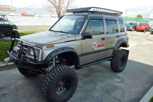 1998 chevy tracker sidekick 4-door 1.6l sas lift toyota axles 33&#034; tires geared