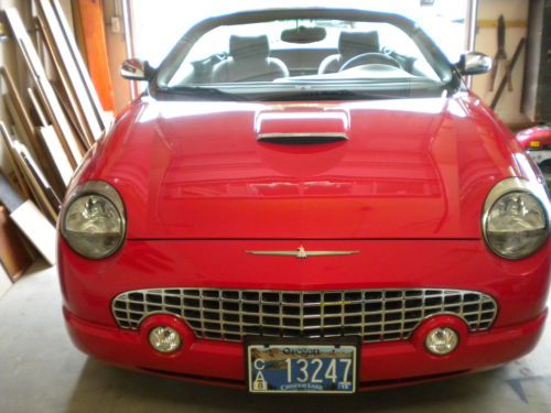 Red convertible, 2 tops, low miles, garage kept/covered, excellent condition