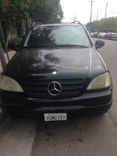 Black ml320 1999; 210,000 miles, runs well for year of vehicle. clean title.