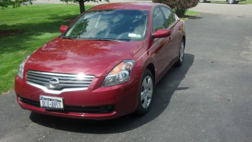 2007 nissan altima, 6-speed manual, good condition, garage kept, 1 owner -maroon