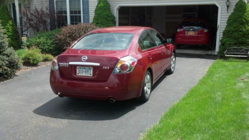 2007 Nissan Altima, 6-speed manual, good condition, garage kept, 1 owner -maroon, image 2